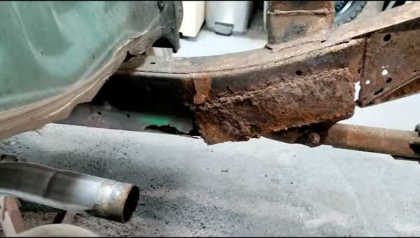 Toyota Tacoma frame rail scaled and rotting